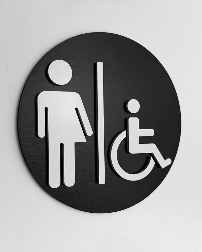 ALUMADESIGNCO inclusive restroom sign with modern accessible pictogram, premium bathroom door signage for offices, hotels, cafés, and commercial interiors