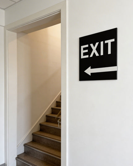 ALUMADESIGNCO exit sign with left arrow and minimalist modern style, wayfinding signage for offices, hotels, apartments, and contemporary interiors