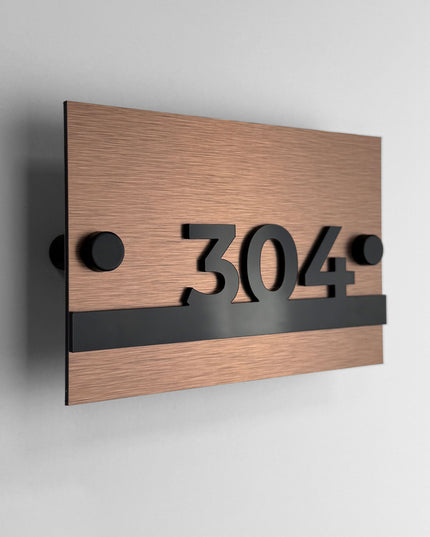 Brushed bronze and acrylic standoff apartment number sign Horizon Design by ALUMADESIGNCO with modern minimalist style, premium door number plaque for apartments and hotel corridors