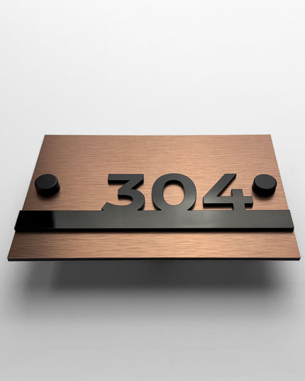 ALUMADESIGNCO Horizon brushed bronze apartment wall number sign with standoff mounting and black acrylic numbers, modern signage for apartments, offices, and hospitality interiors