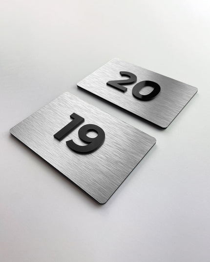 ALUMADESIGNCO brushed silver door number sign with acrylic numbers, premium modern signage for boutique hotels and apartment buildings
