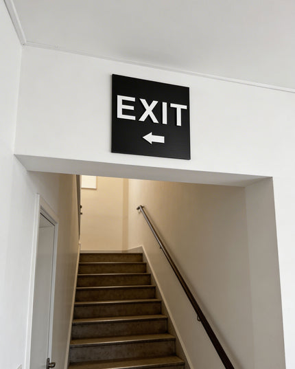 Modern exit left arrow sign by ALUMADESIGNCO featuring clean directional style, elegant interior signage for hotels, cafés, offices, and public interiors