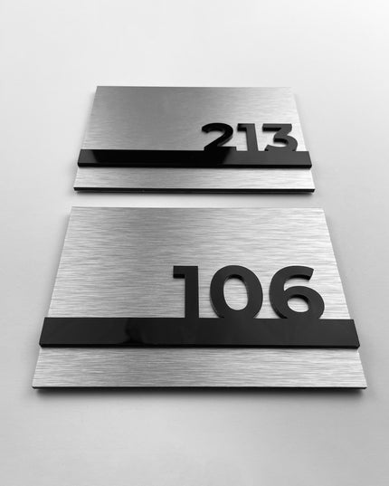 Premium custom hotel room number plaque by ALUMADESIGNCO featuring silver metal plaque and black acrylic numbers, modern door signage for hotels and offices
