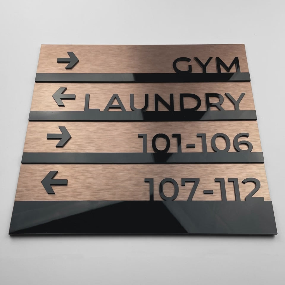 ALUMADESIGNCO directional wall plaque with Bronze Modern styling, premium wayfinding signage for offices, hospitality spaces, apartment buildings, and interiors