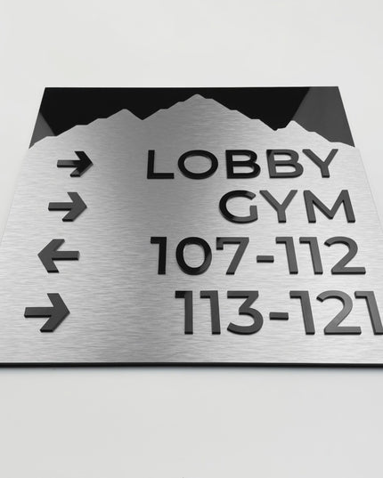 Premium Mountain directional sign by ALUMADESIGNCO with aluminium plate, modern wayfinding signage for lobbies, hallways, offices, and hospitality interiors