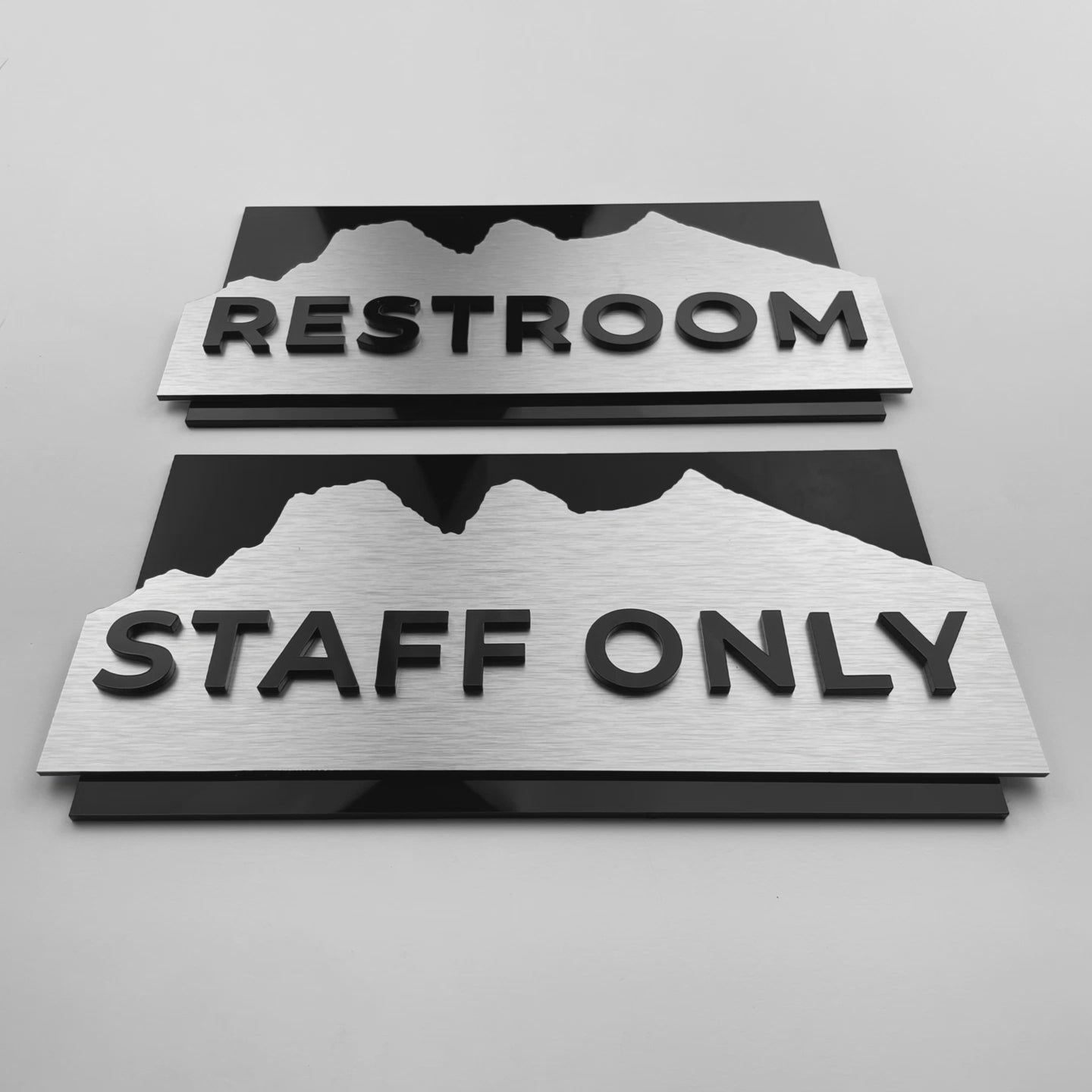 ALUMADESIGNCO Alpine Design custom hotel door sign with elegant modern style, wayfinding signage for staff only areas, offices, restrooms, and commercial interiors