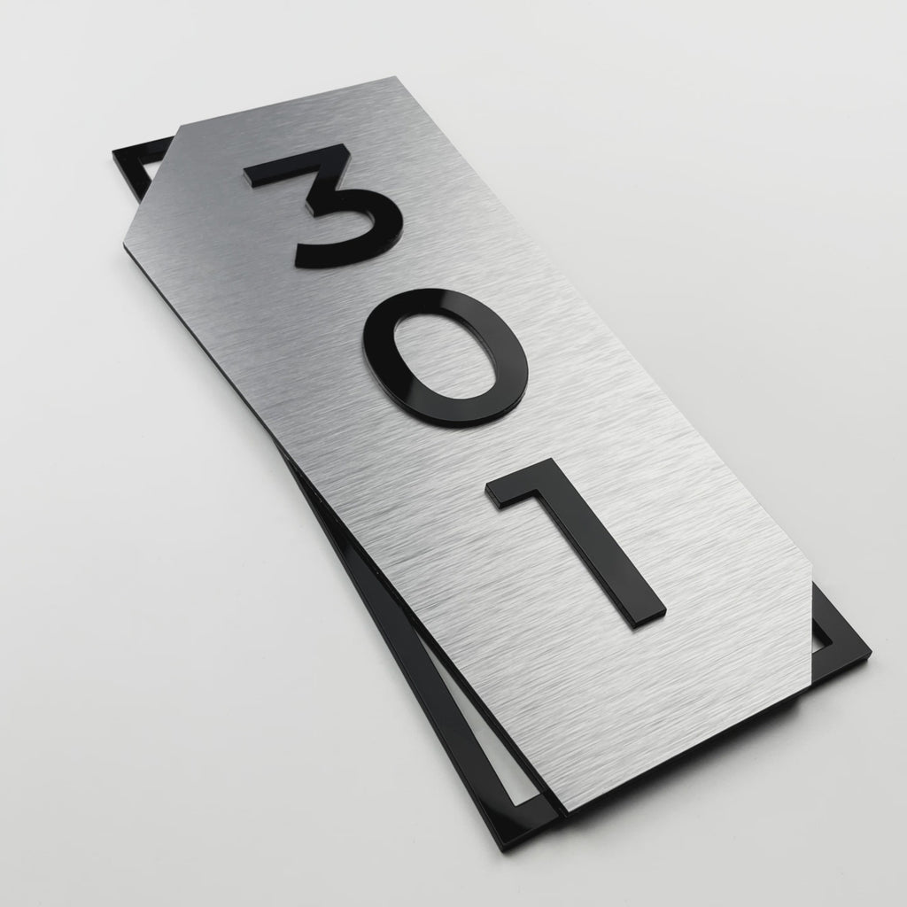 Premium vertical brushed silver and black acrylic glass door number sign by ALUMADESIGNCO, stylish signage for hotel rooms and apartment doors