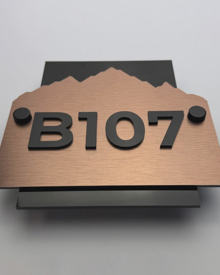 ALUMADESIGNCO Alpine brushed bronze wall number plaque with raised acrylic numbers and standoff mounting for hotel rooms and modern apartments