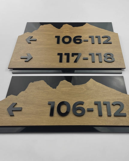 ALUMADESIGNCO birch wood and black acrylic wayfinding sign in Alpine Design with elegant modern style, directional signage for offices, hotels, apartments, and interior spaces