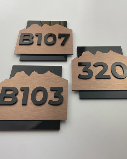 ALUMADESIGNCO Alpine Design bronze room number sign with minimalist modern style, premium signage for boutique hotels and apartment buildings