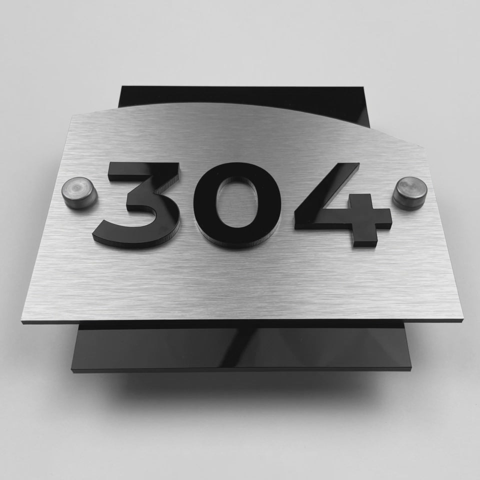 ALUMADESIGNCO brushed silver and acrylic 3D number hotel room sign Flow Design with minimalist modern style, premium door plaque for hospitality interiors