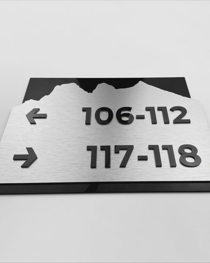 ALUMADESIGNCO brushed silver directional sign with black acrylic lettering, premium wayfinding signage for offices, Airbnb properties, hotels, and public interiors
