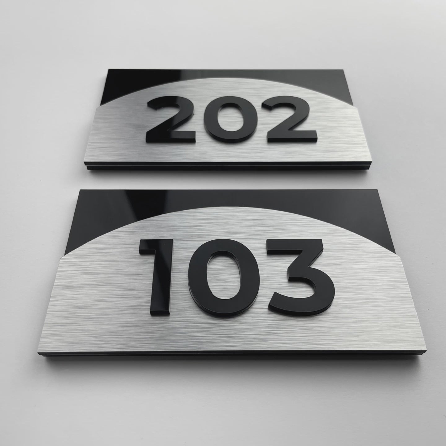 ALUMADESIGNCO Flow Design custom 3D layered room number plaque with minimalist modern style, stylish door signage for hotels, apartments, Airbnb properties, and offices