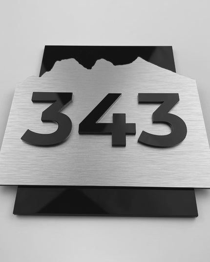 Premium hotel room number sign Alpine Design by ALUMADESIGNCO combining brushed silver aluminum plaque and black acrylic numbers, stylish door signage for hospitality interiors
