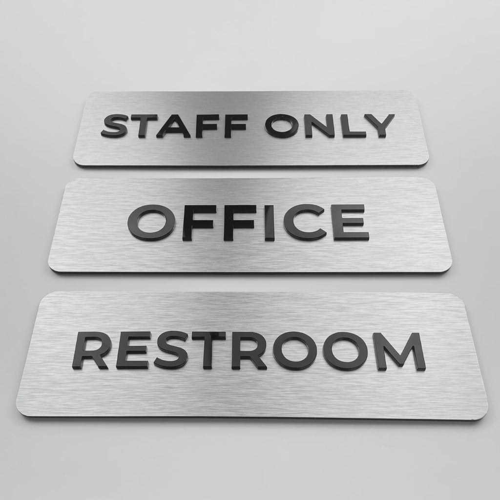 Premium silver metal office door sign by ALUMADESIGNCO featuring black acrylic lettering, modern signage for offices, conference rooms, and hospitality interiors