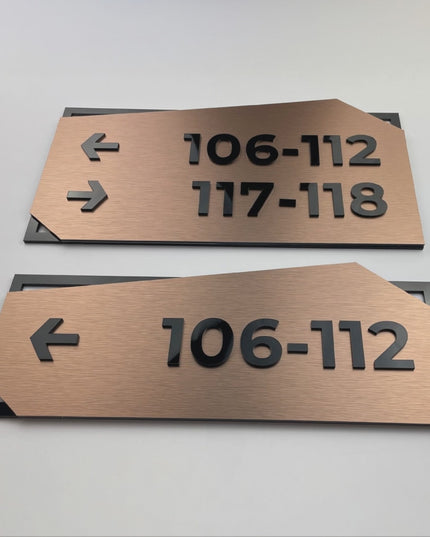 ALUMADESIGNCO brushed bronze and black acrylic wayfinding sign with elegant modern style, directional signage for offices, hotels, apartments, and contemporary interiors