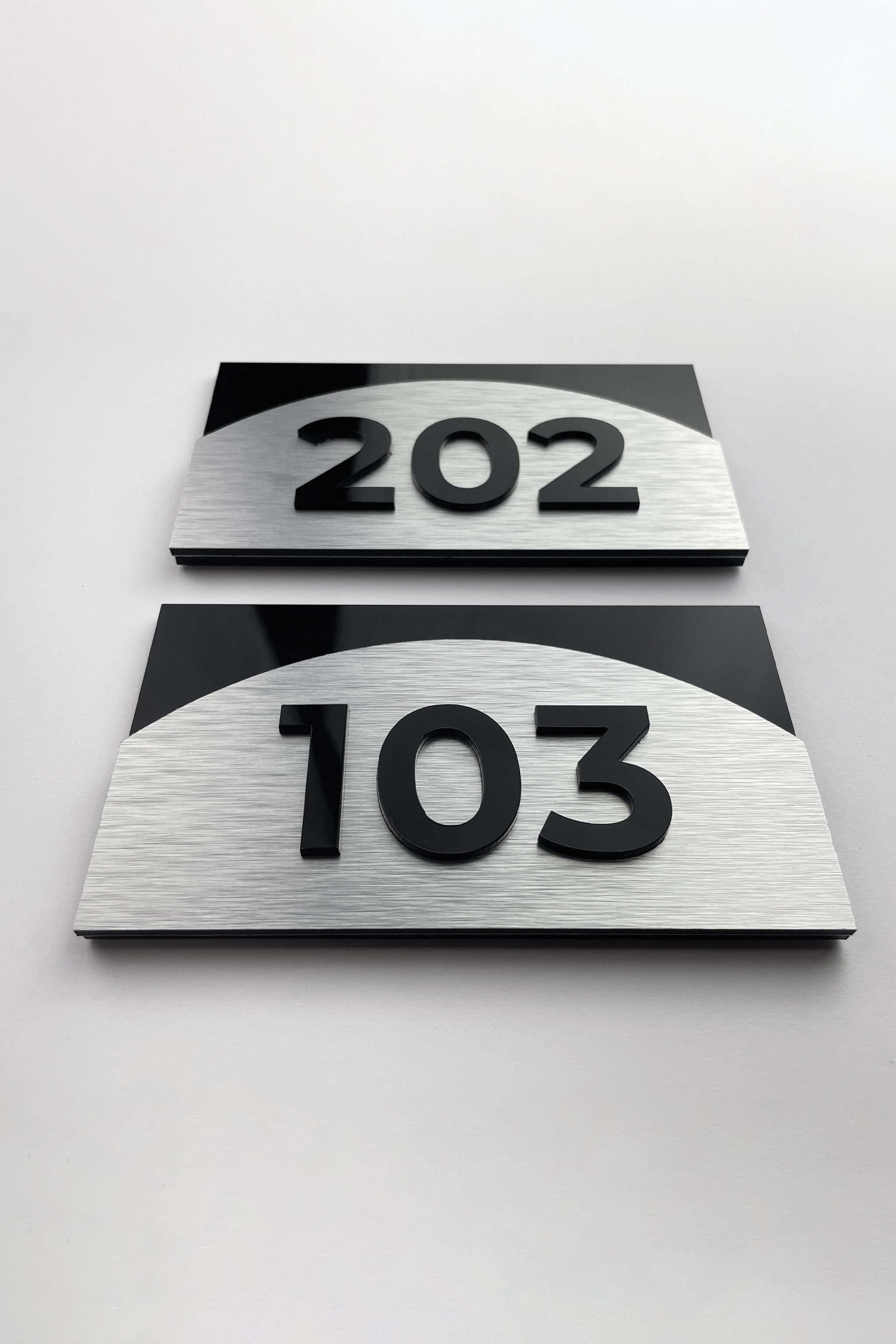 ALUMADESIGNCO Flow custom 3D layered door number sign with raised acrylic numbers, premium signage for hotels, offices, and residential interiors